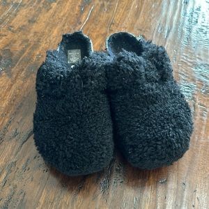 Black fuzzy slip ons. Papillio made by Birkenstock